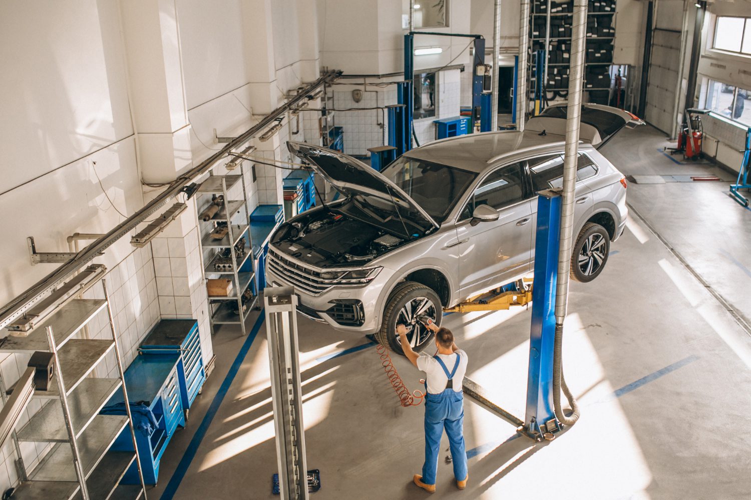 auto-mechanic-checking-car